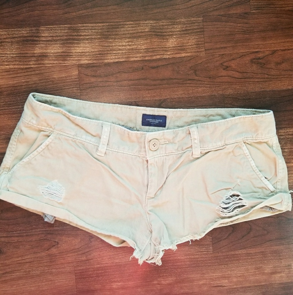Khaki distressed American eagle shorts